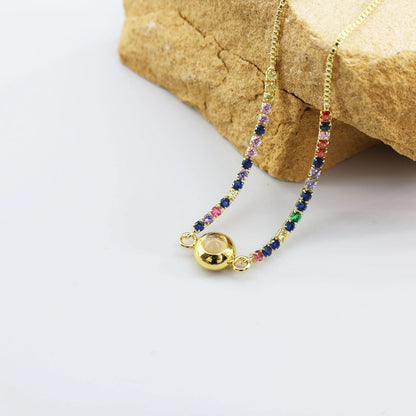 Bracciale con proiezione di zirconi colorati