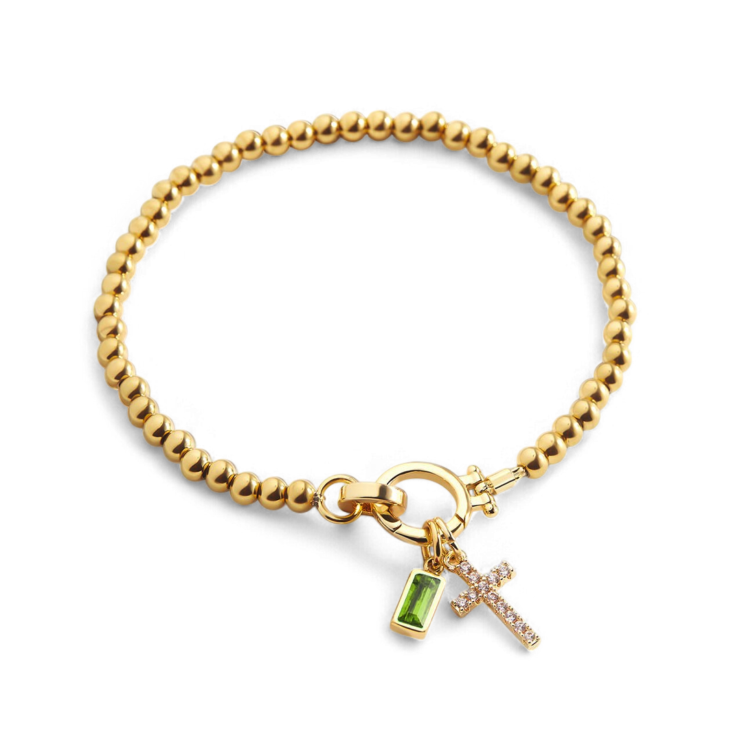 Bracciale con ciondolo a croce e pietra portafortuna