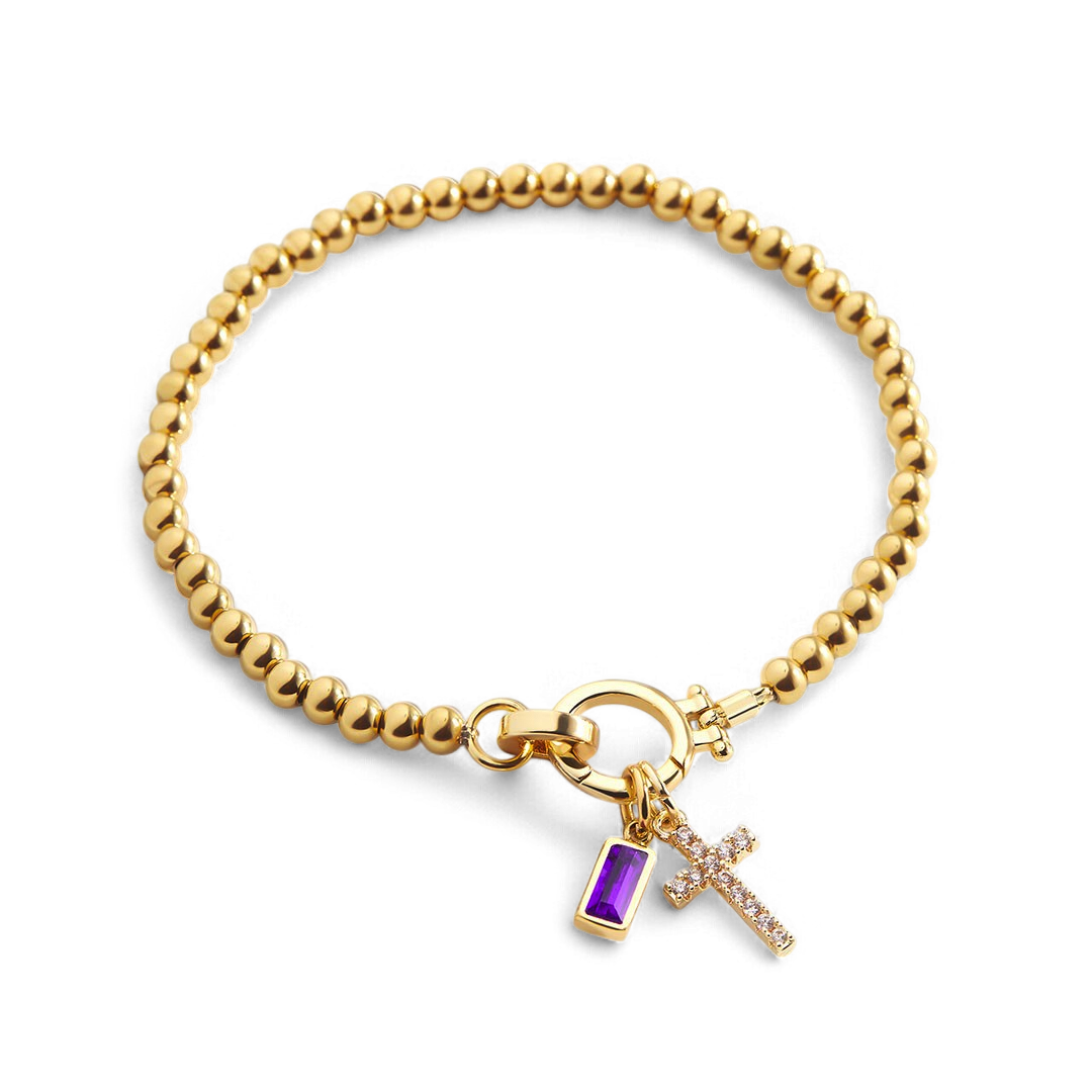 Bracciale con ciondolo a croce e pietra portafortuna
