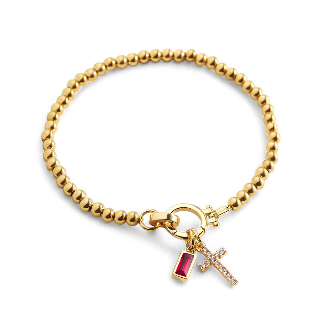 Bracciale con ciondolo a croce e pietra portafortuna
