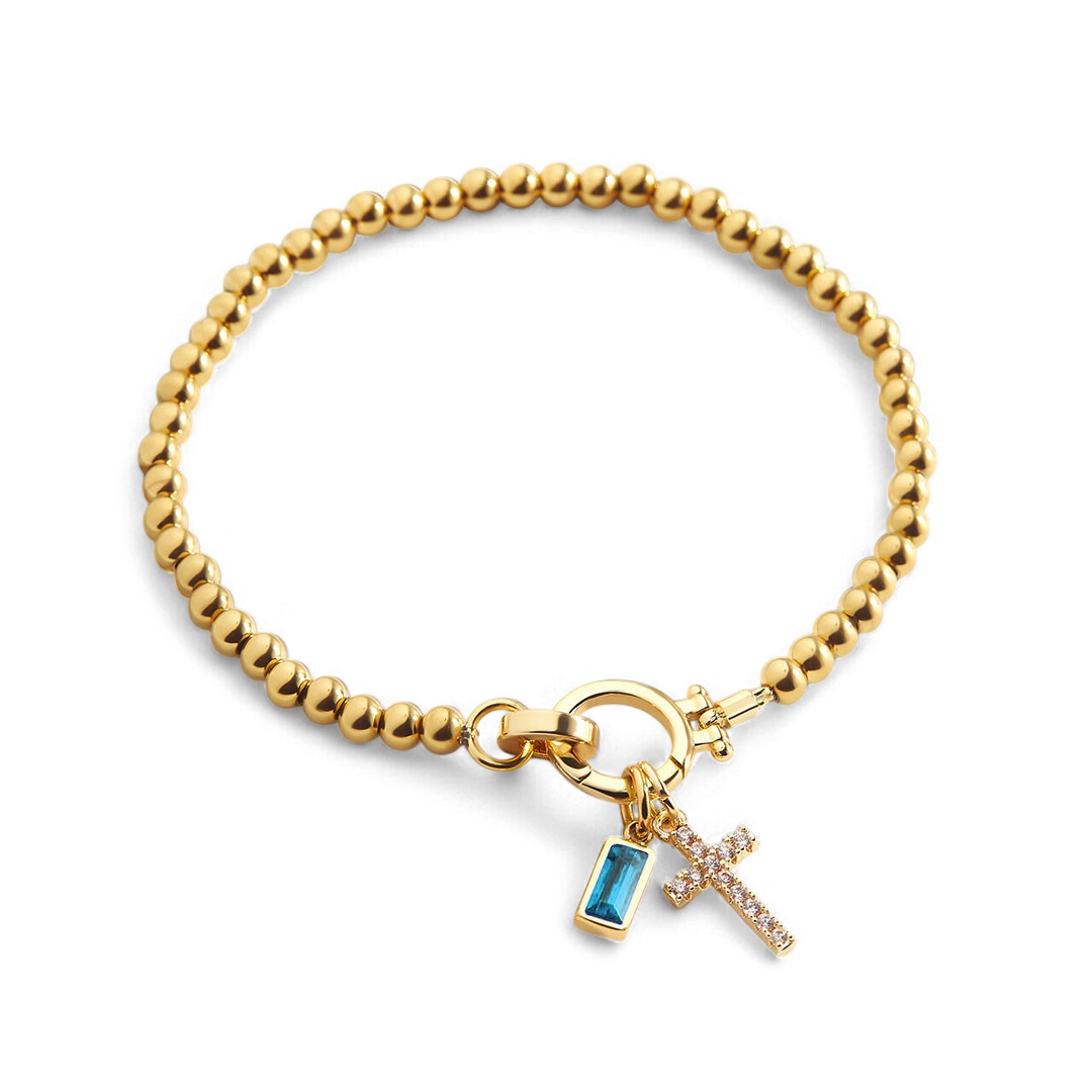 Bracciale con ciondolo a croce e pietra portafortuna