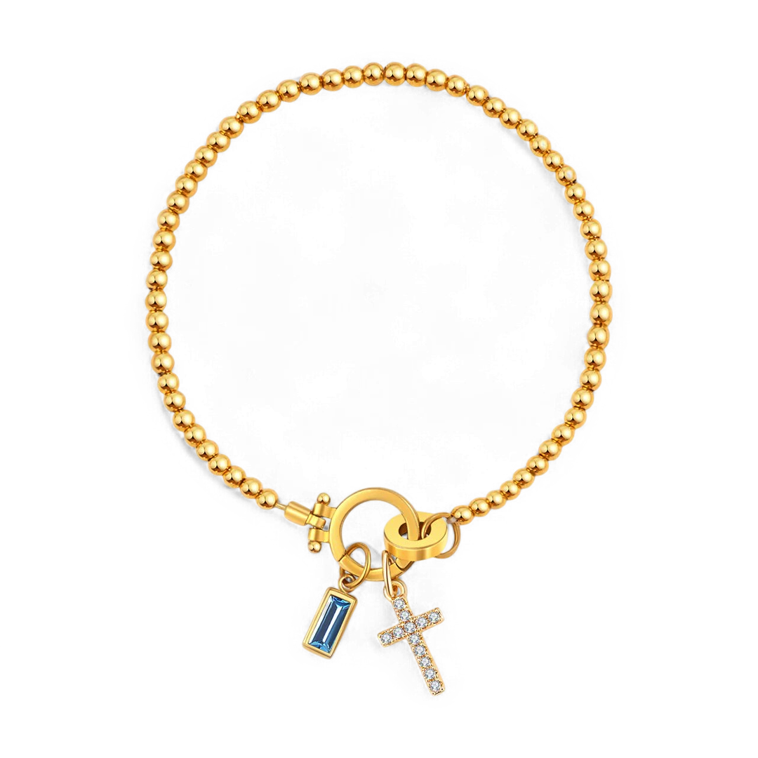 Bracciale con ciondolo a croce e pietra portafortuna