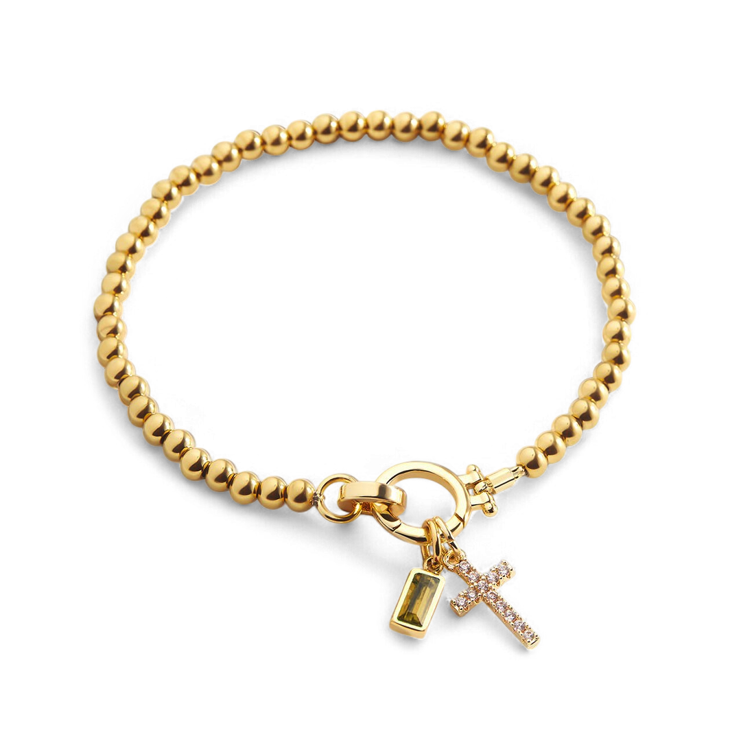Bracciale con ciondolo a croce e pietra portafortuna