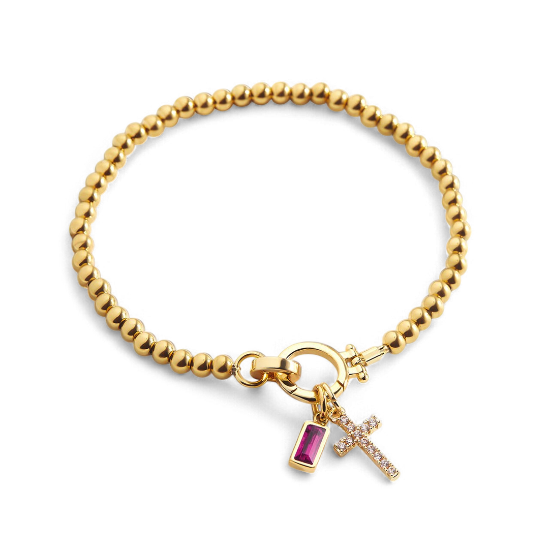 Bracciale con ciondolo a croce e pietra portafortuna