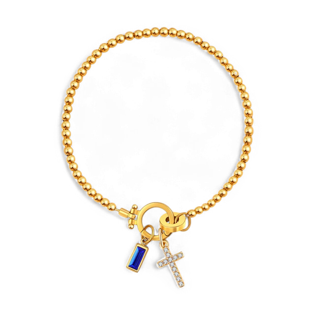 Bracciale con ciondolo a croce e pietra portafortuna