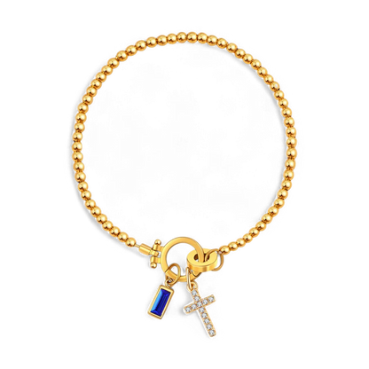 Bracciale con ciondolo a croce e pietra portafortuna