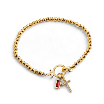 Bracciale con ciondolo a croce e pietra portafortuna