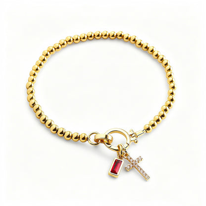 Bracciale con ciondolo a croce e pietra portafortuna