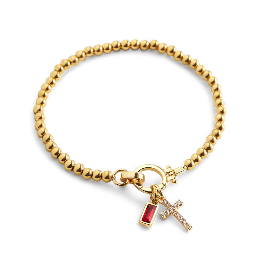 Bracciale con ciondolo a croce e pietra portafortuna