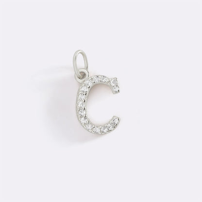 Charm con iniziale pavé delicato