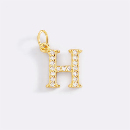 Charm con iniziale pavé delicato