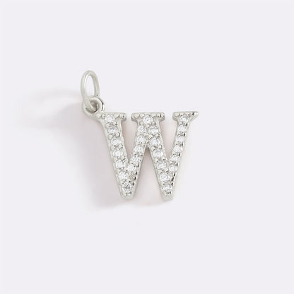 Charm con iniziale pavé delicato