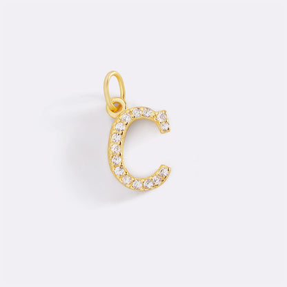 Charm con iniziale pavé delicato